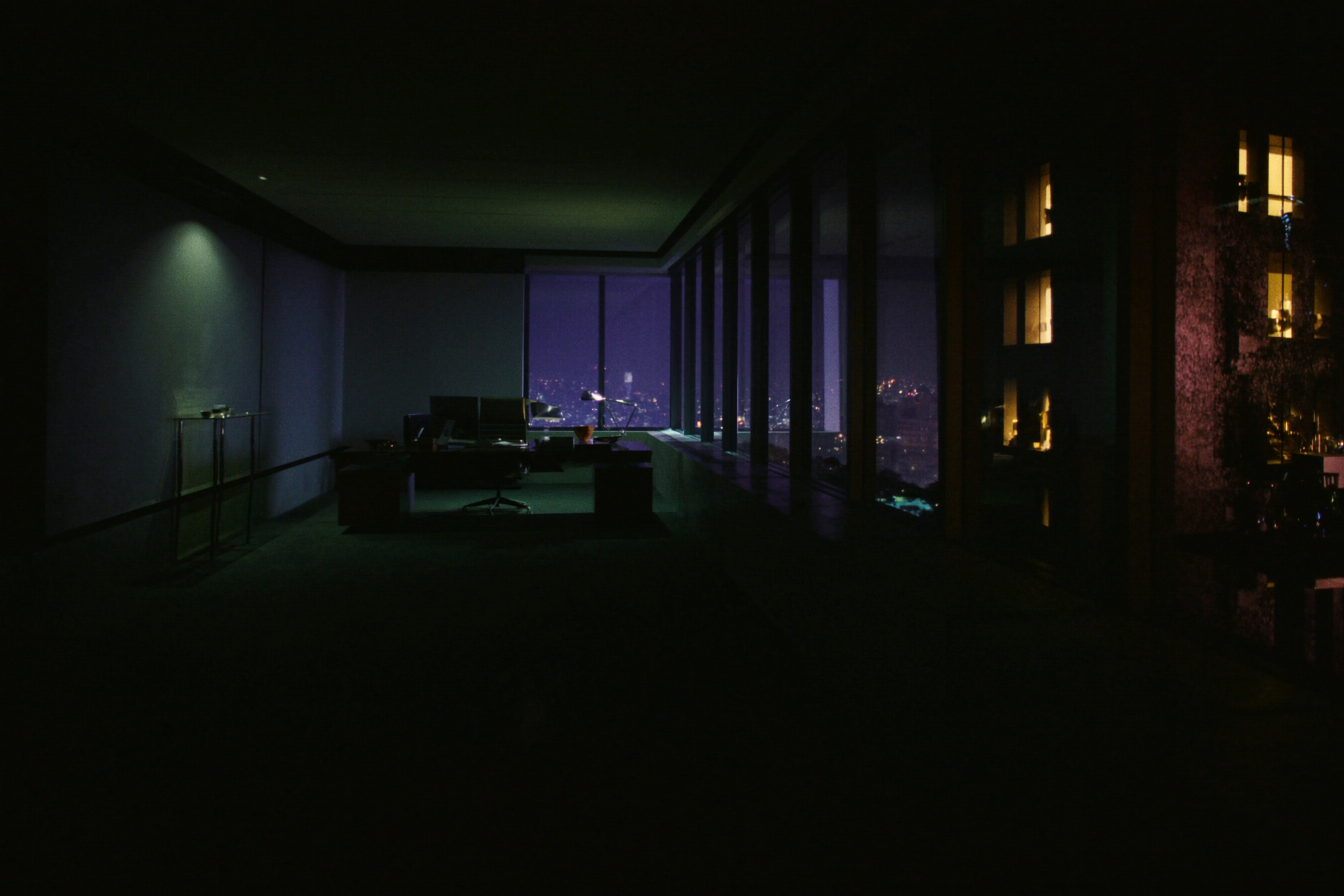 Corner office overlooking the city at dusk